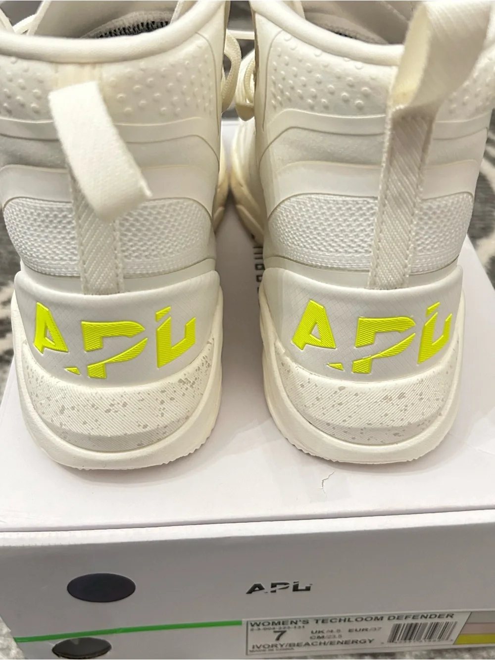 APL Women’s Techloom Defender High-Top Sneakers in Cream with Neon Yellow Logo